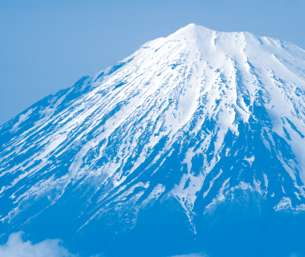Monotone blue image of the snow-covered pinnacle of Mount Fuji